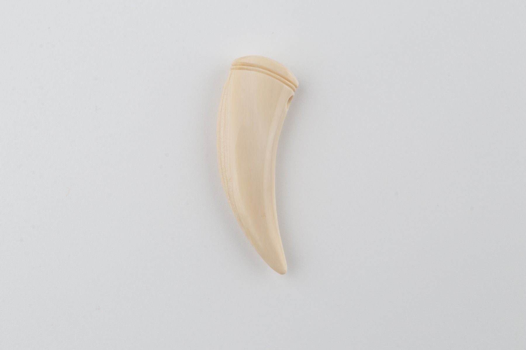 Carved mammoth ivory pendant