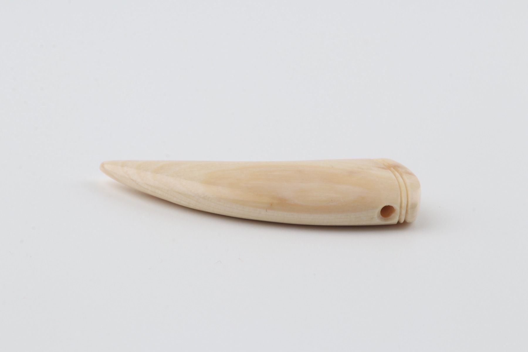 Carved mammoth ivory pendant