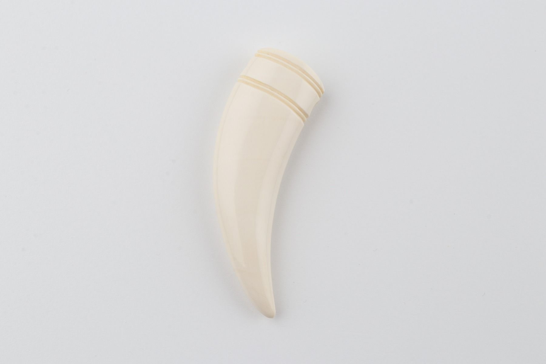 Carved mammoth ivory pendant