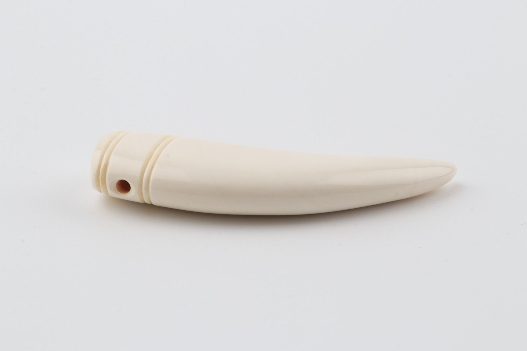 Carved mammoth ivory pendant