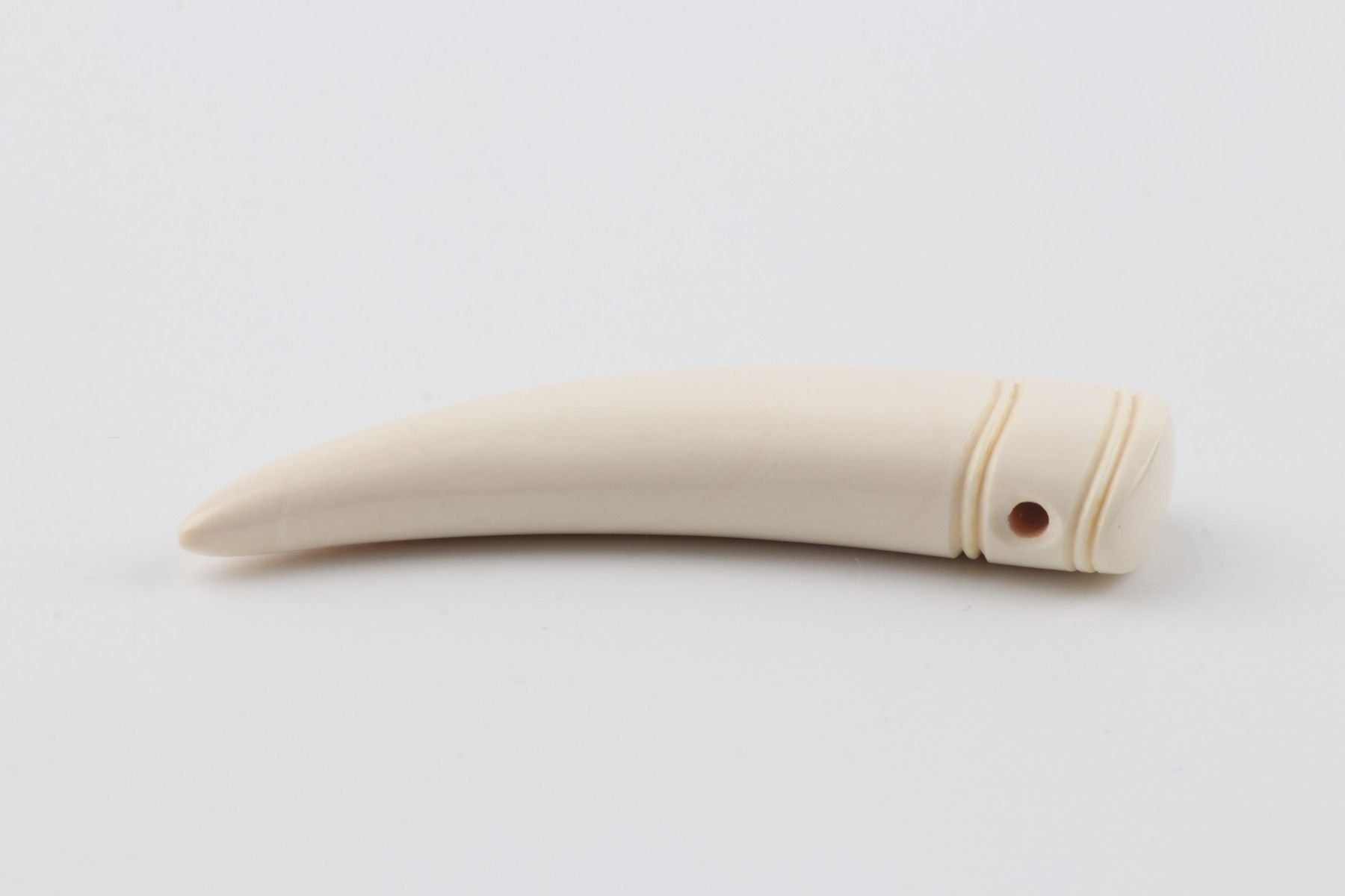 Carved mammoth ivory pendant