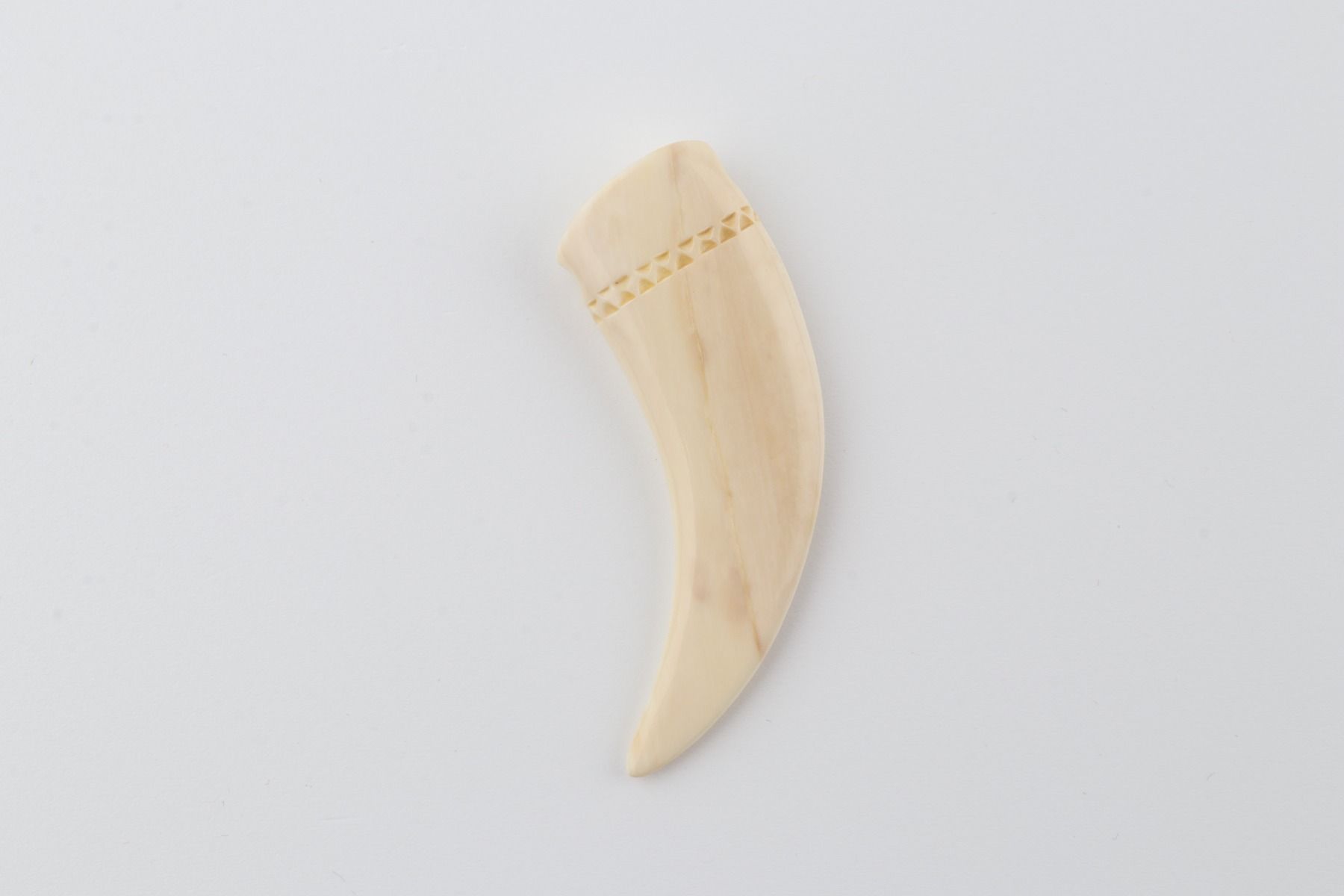 Carved mammoth ivory pendant