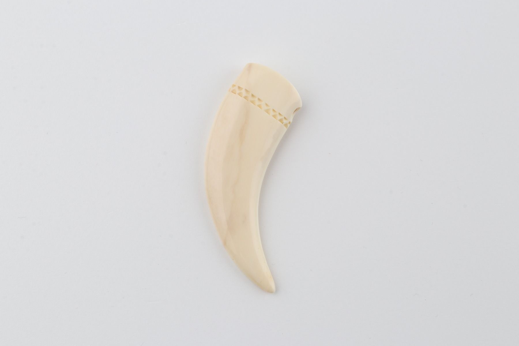 Carved mammoth ivory pendant