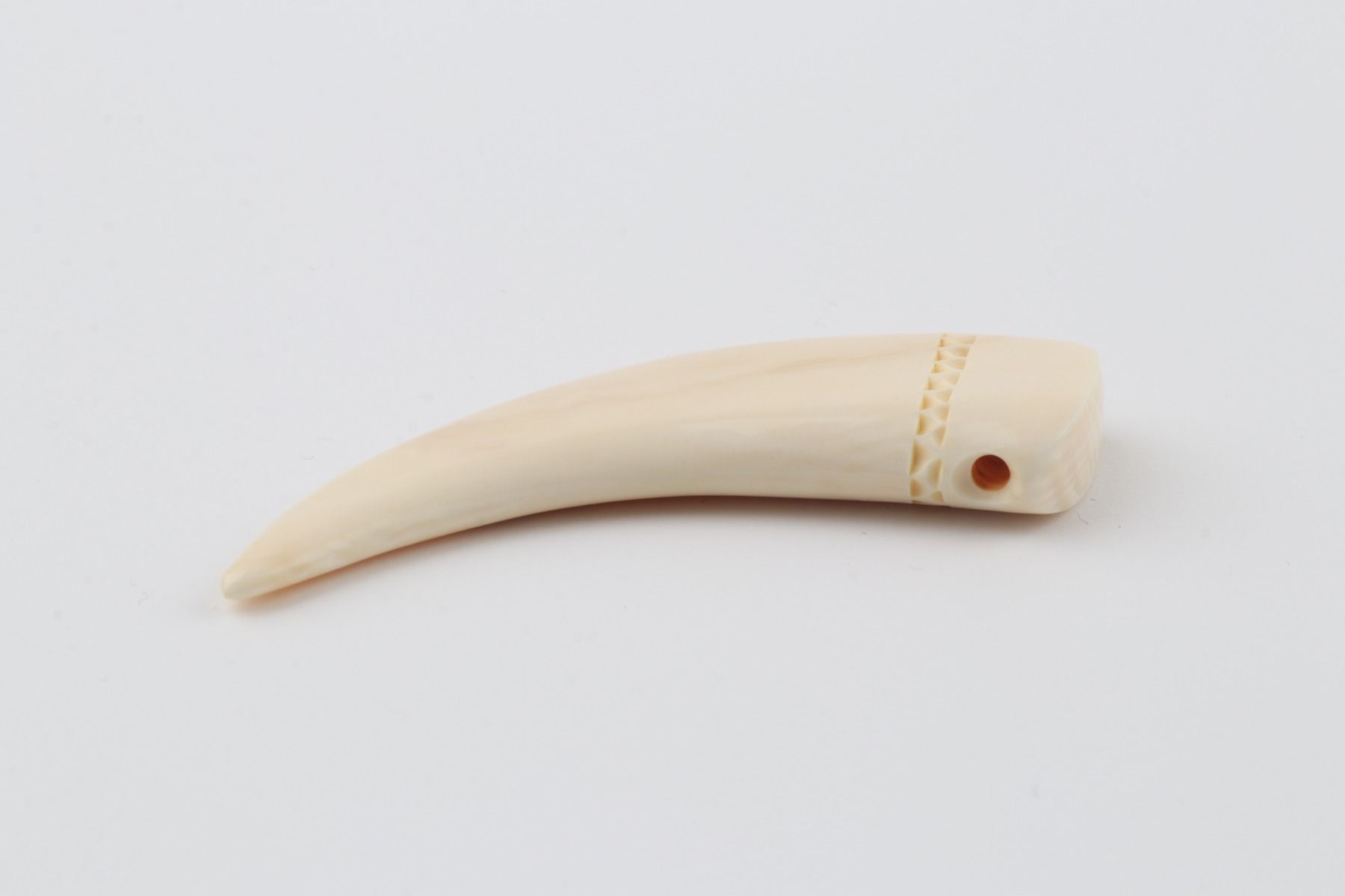 Carved mammoth ivory pendant