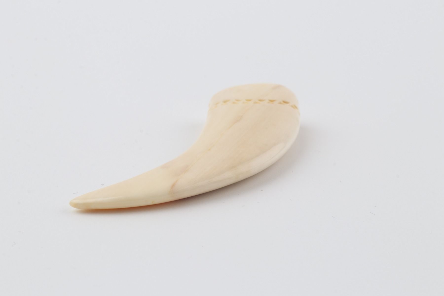 Carved mammoth ivory pendant