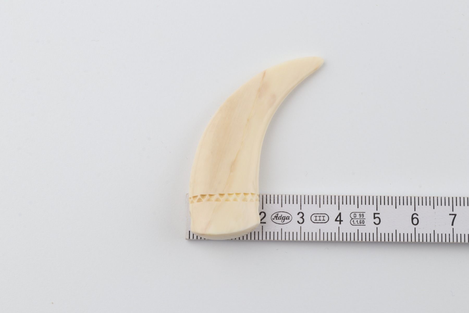 Carved mammoth ivory pendant