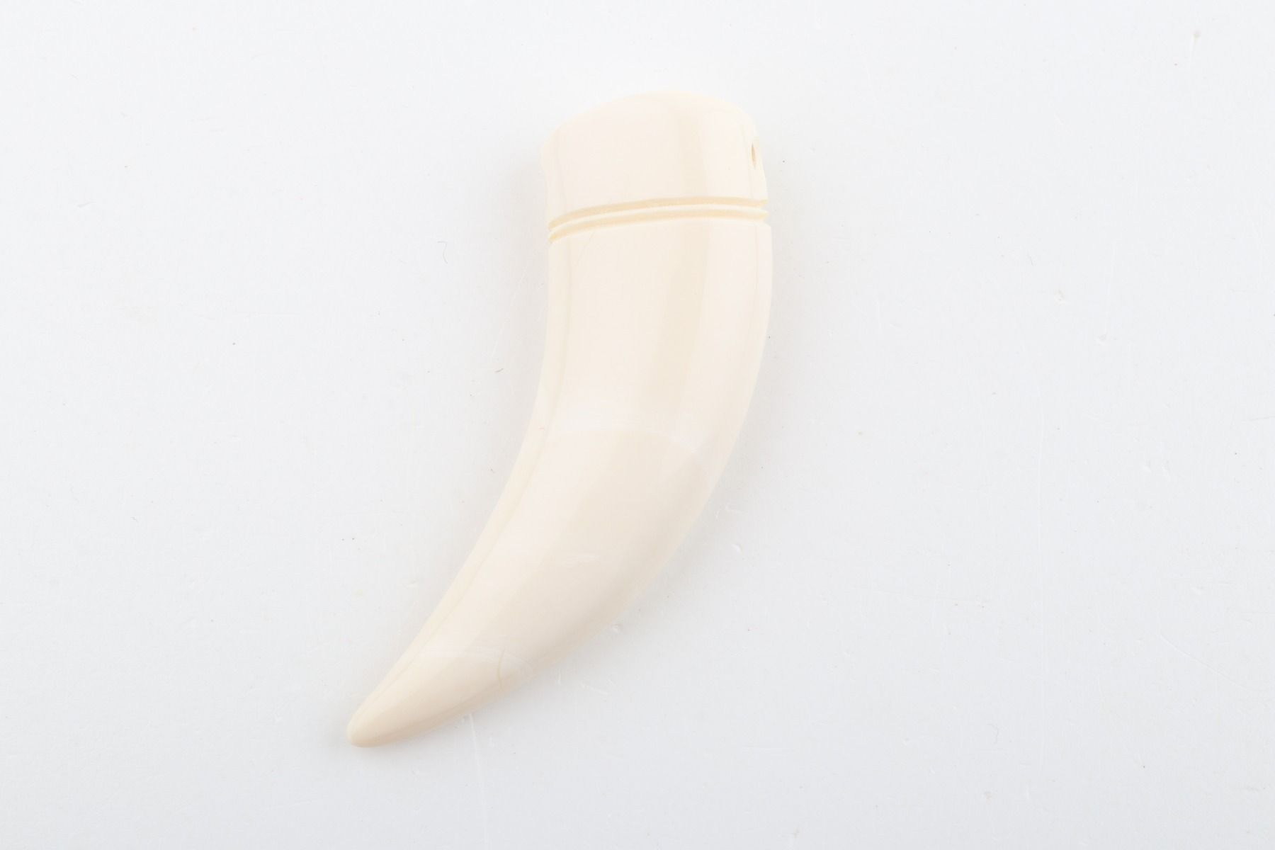 Carved mammoth ivory pendant