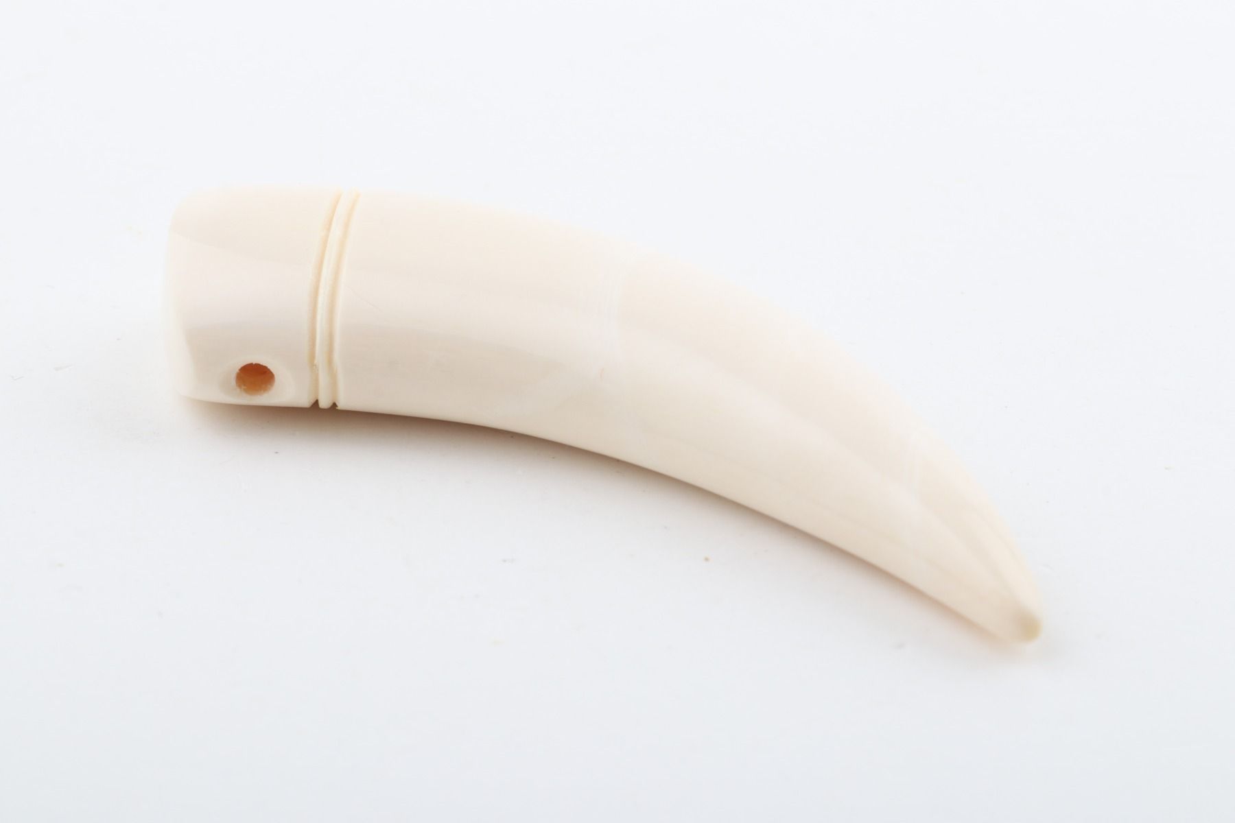 Carved mammoth ivory pendant
