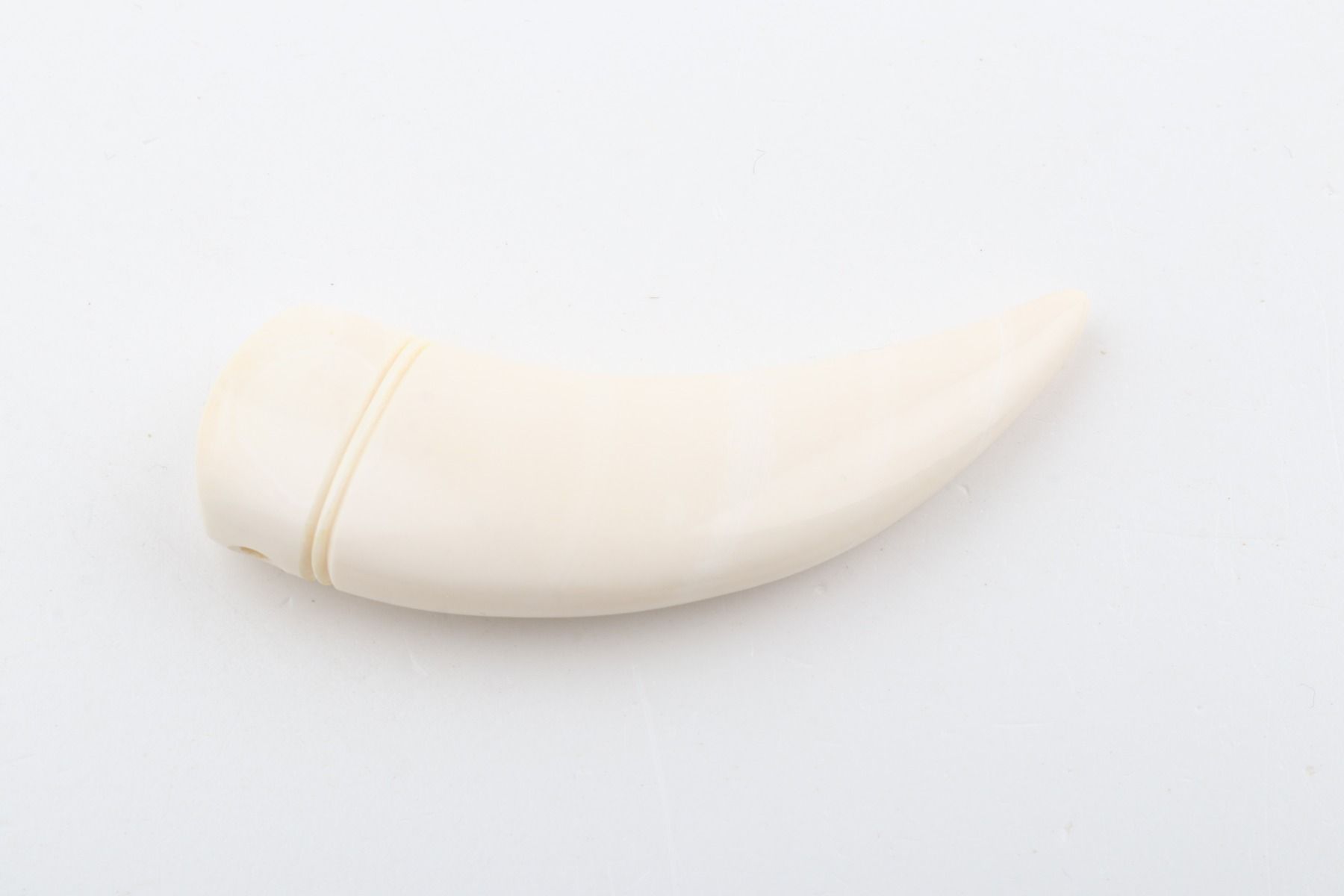 Carved mammoth ivory pendant