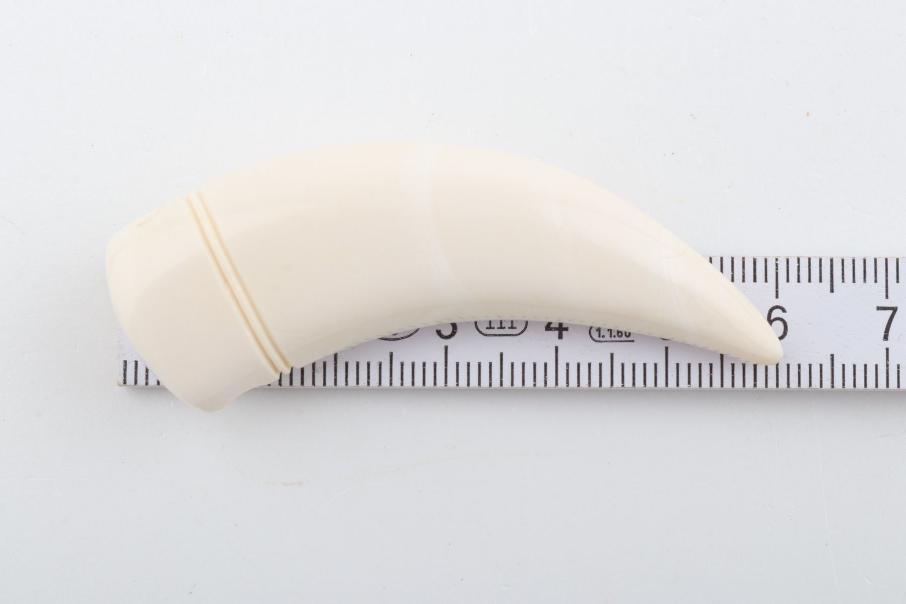 Carved mammoth ivory pendant