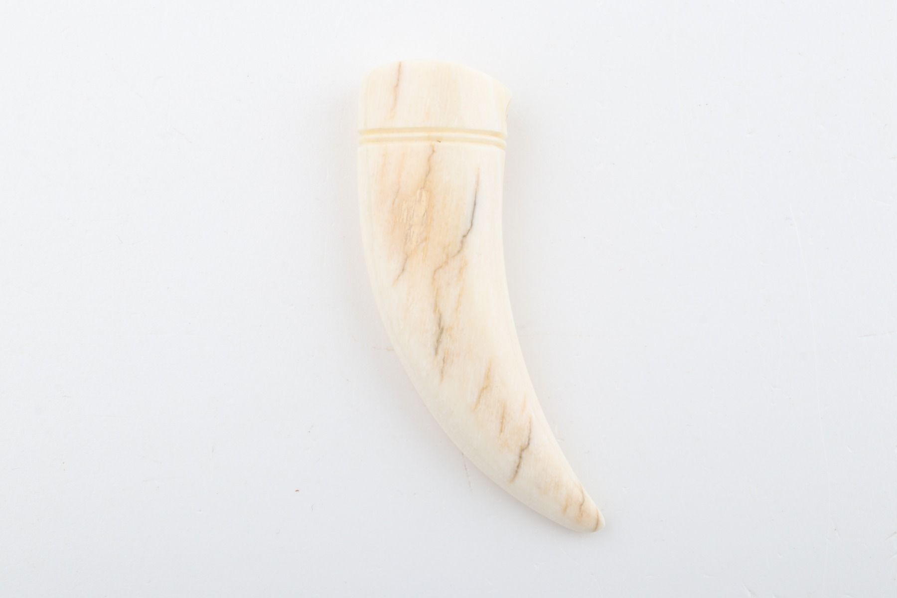 Carved mammoth ivory pendant