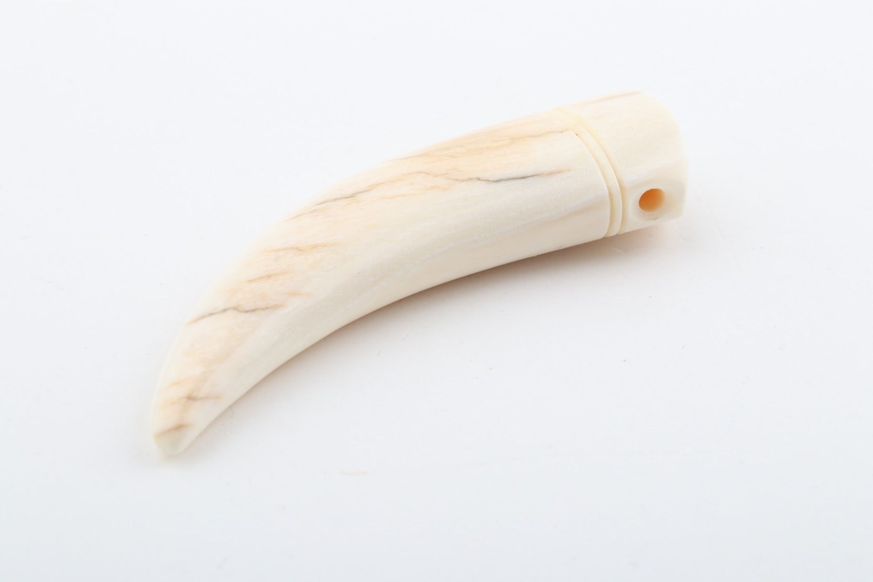 Carved mammoth ivory pendant