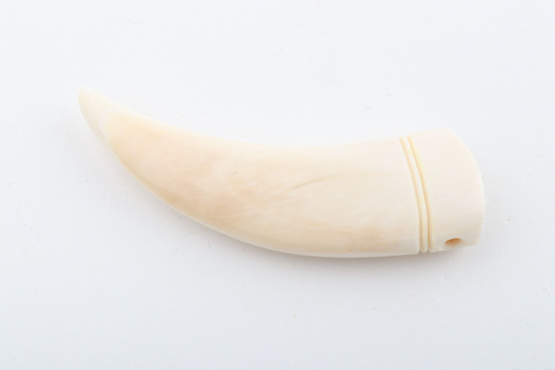 Carved mammoth ivory pendant