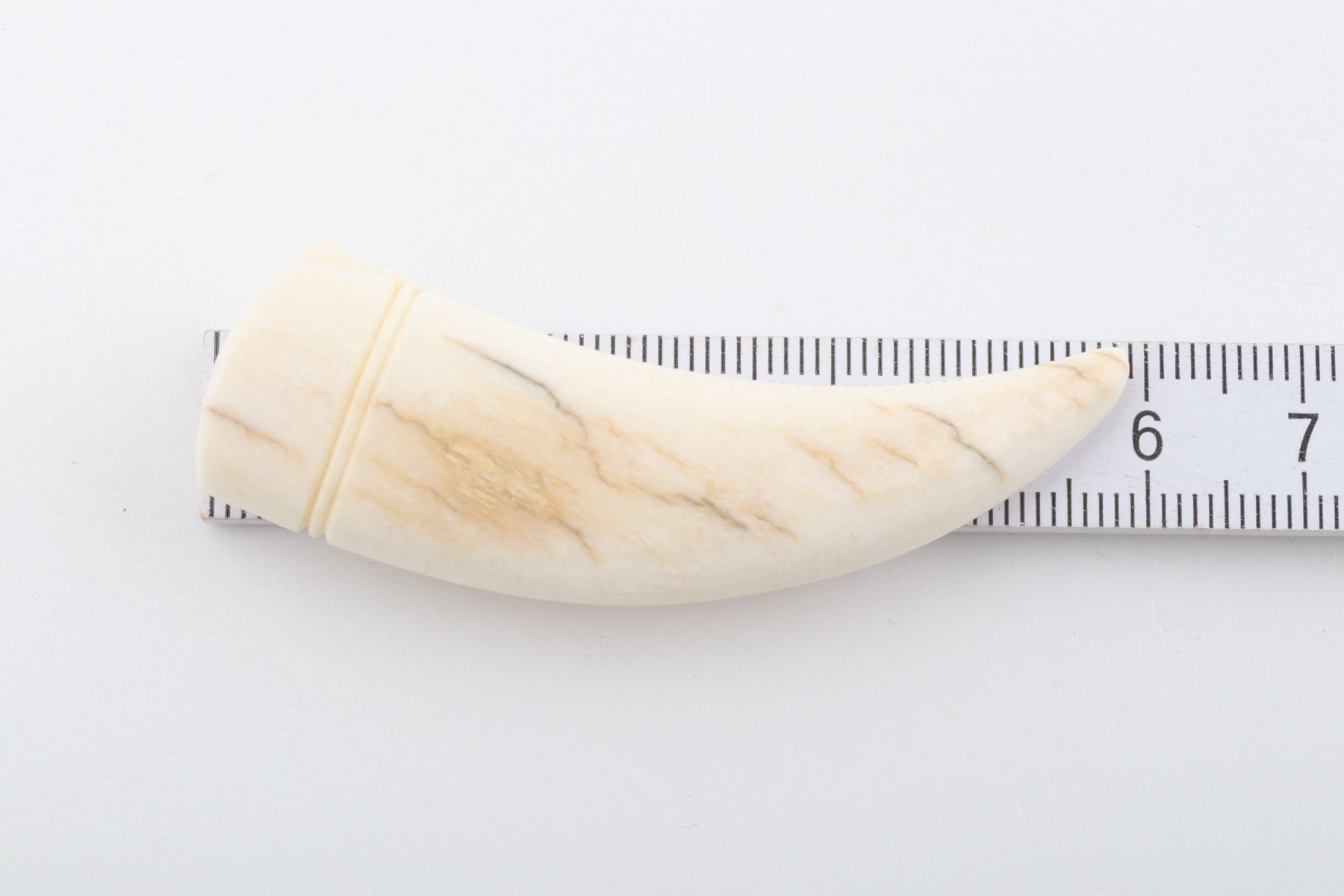 Carved mammoth ivory pendant