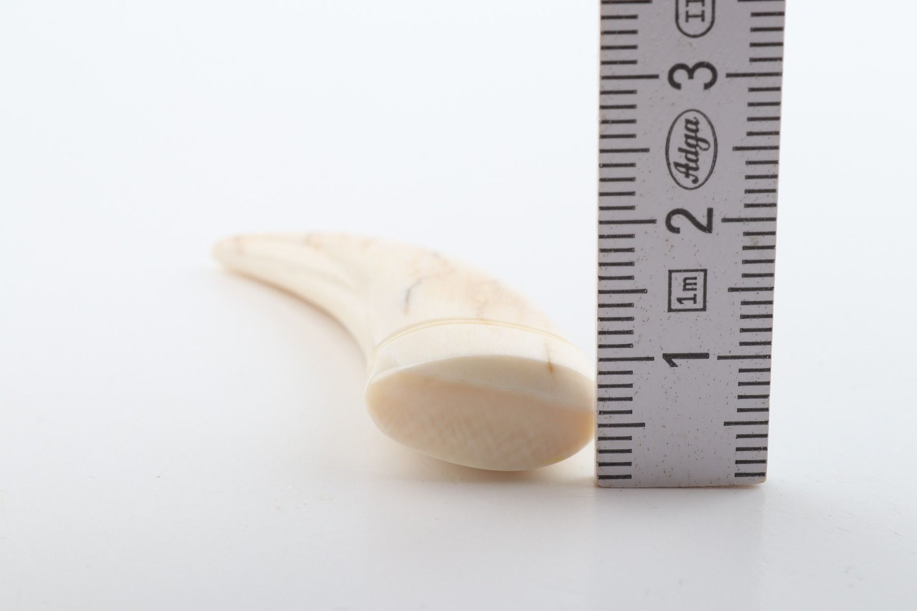Carved mammoth ivory pendant