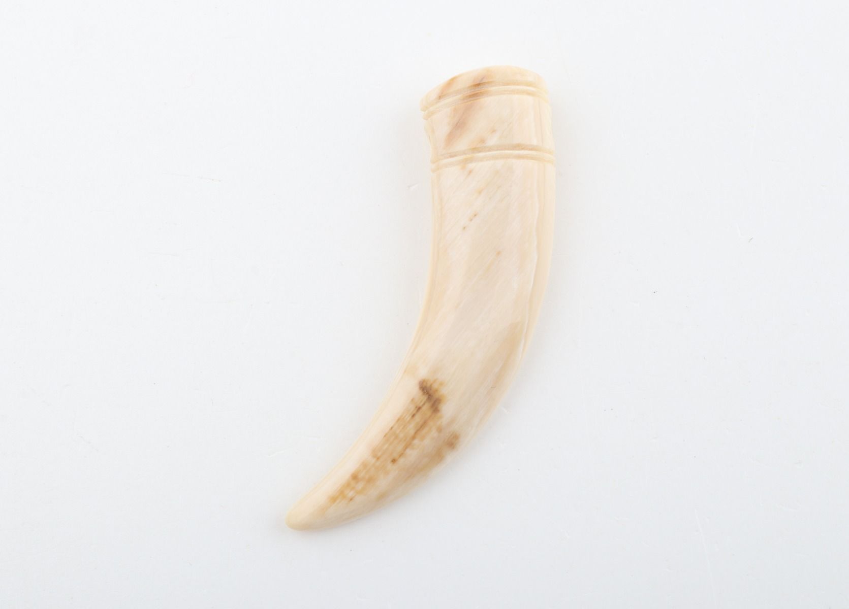 Carved mammoth ivory pendant