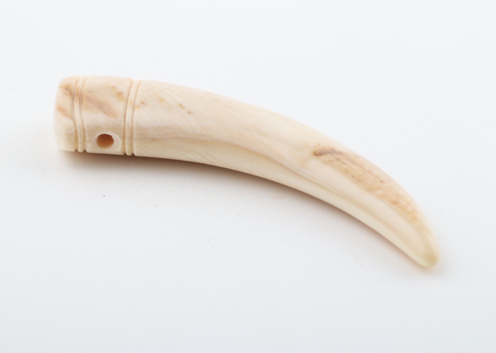 Carved mammoth ivory pendant