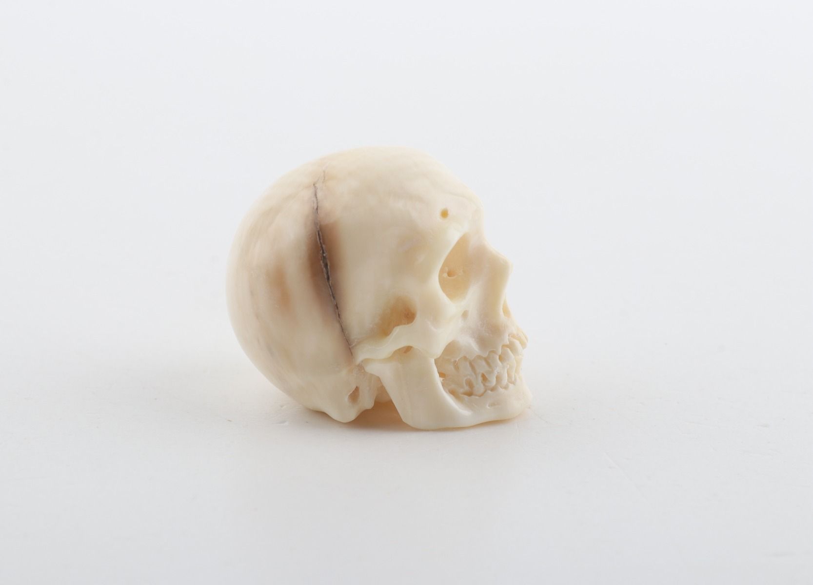 Hand carved mammoth ivory skull