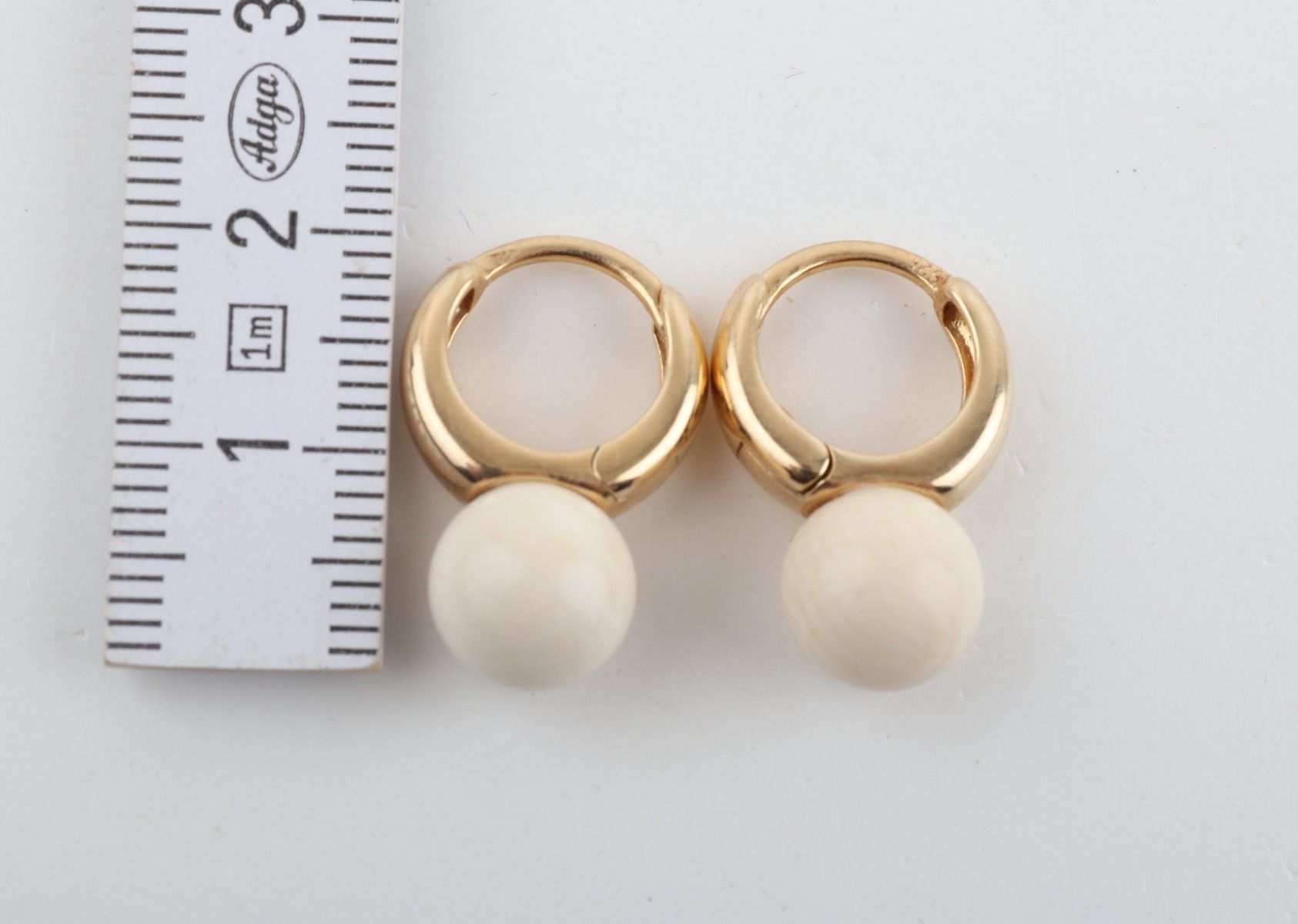 Minimalistic Mammoth Ivory Hoops