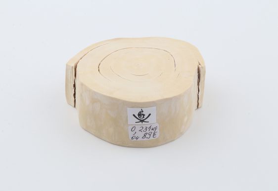 Round mammoth ivory piece