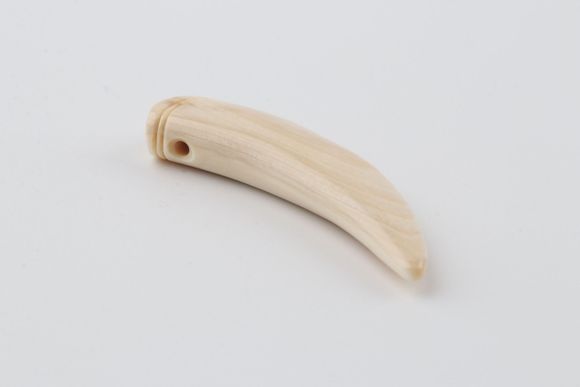 Carved mammoth ivory pendant