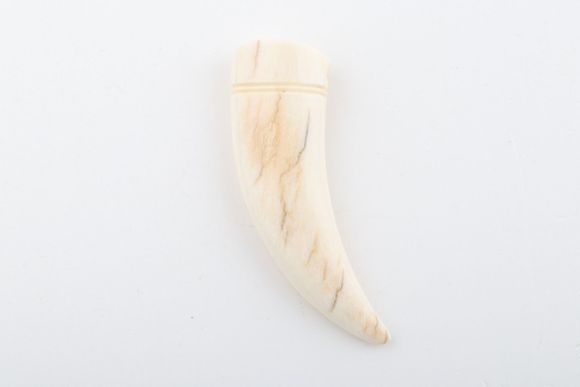 Carved mammoth ivory pendant